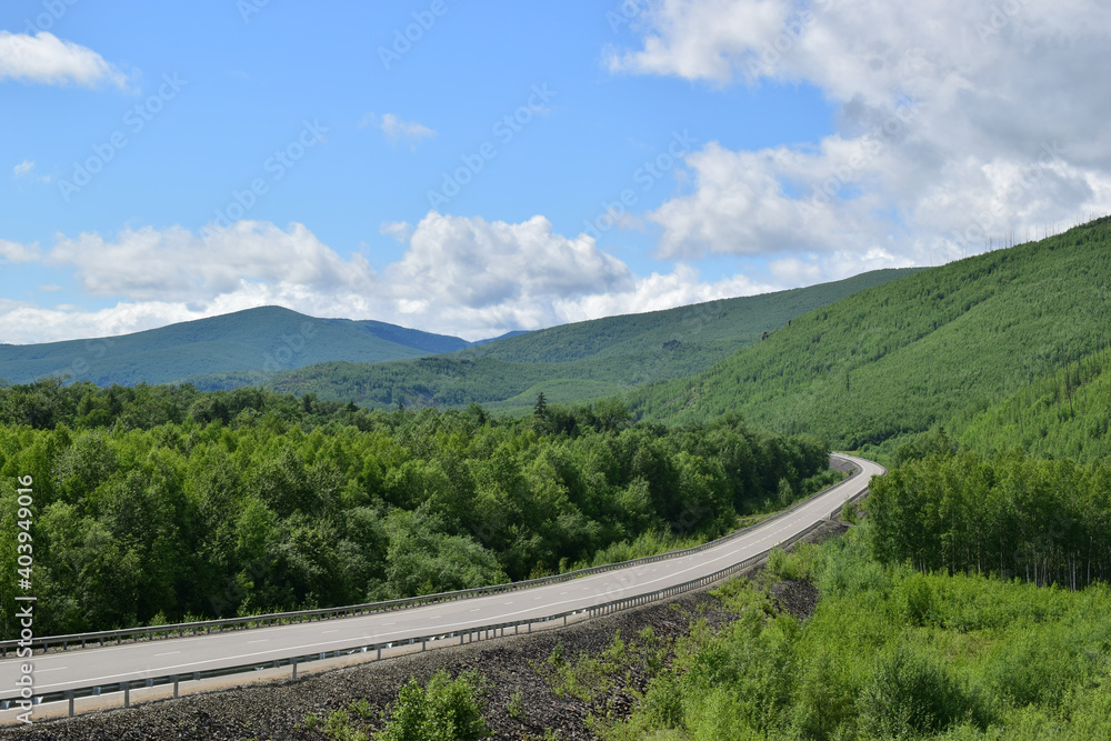 View of the highway among the green hills.