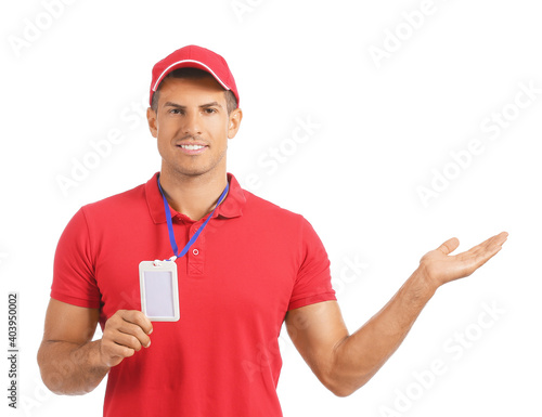 Young man with blank badge ...