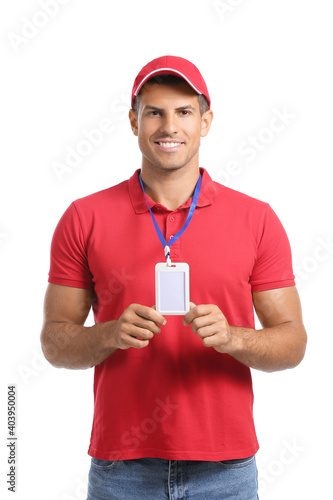 Young man with blank badge ...