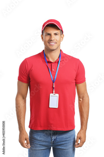 Young man with blank badge ...