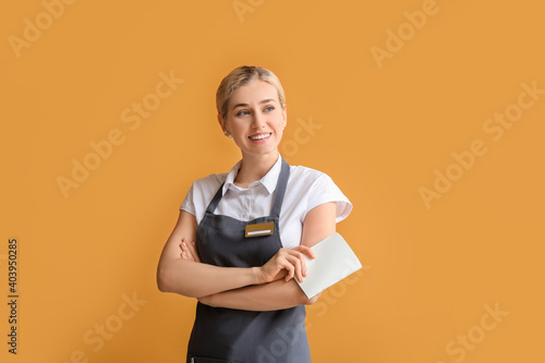 Young female waiter with bl...