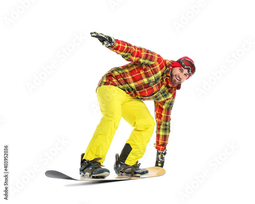 Male snowboarder on white b...
