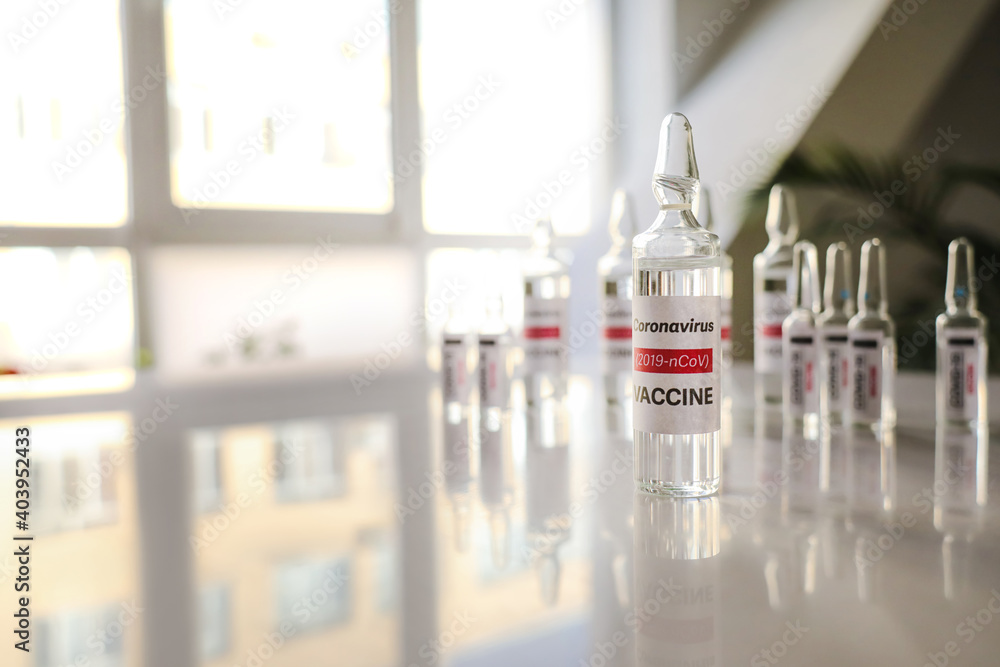 Vaccine for immunization against COVID-19 on table Vaccine for immunization against COVID-19 on table