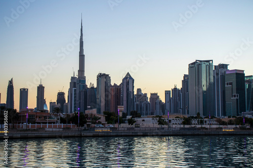 Dubai, UAE - 01.08.2021 View of the Dubai city skyline at Dubai Water Canal. Business Bay district. Tallest building in the world Burj Khalifa can be seen in the picture. Outdoors