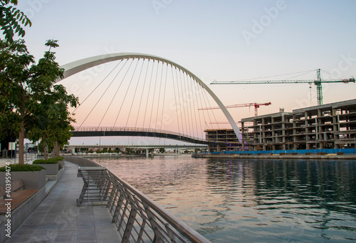 Dubai, UAE - 01.08.2021 Bridge over a Dubai Water canal known as Tolerance bridge. Outdoors
