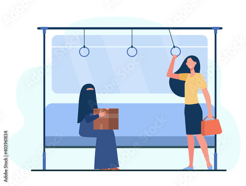 Train passenger standing in carriage near  woman