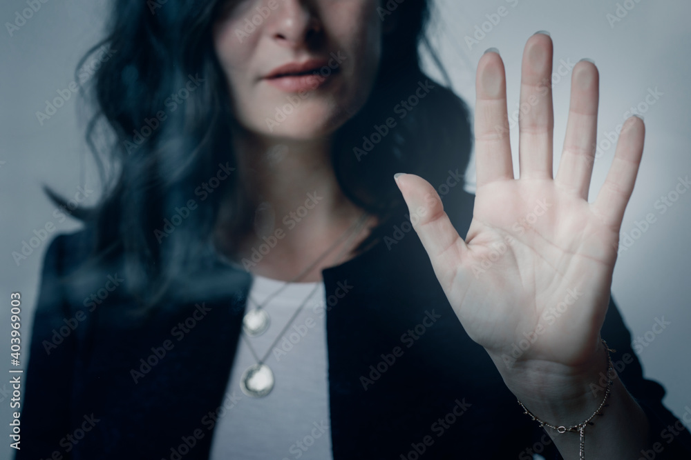 Woman with a beautiful hand touching the window Woman with a beautiful hand touching the window