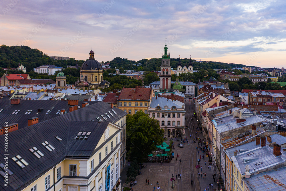 Aerial view on Market square, Dormition, Dominican and Carmelite Church in Lviv, Ukraine from drone