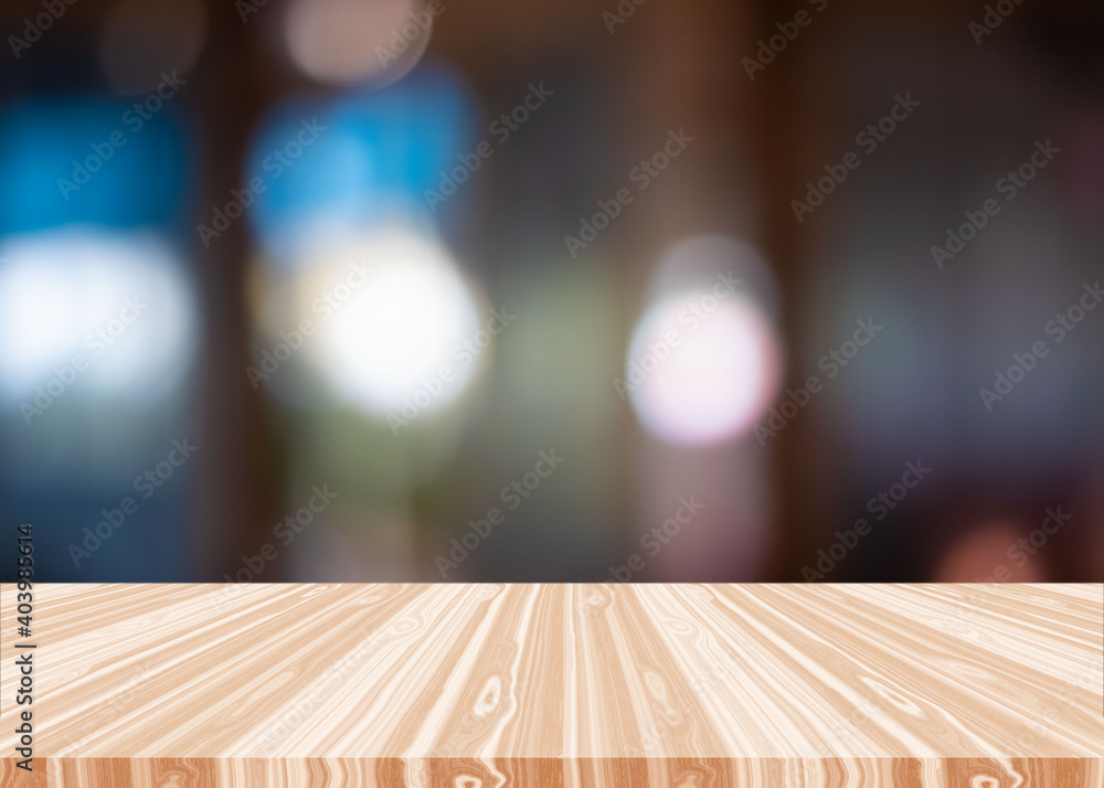 Empty wooden table isolated on blur background, used for display your products. Empty wooden table isolated on blur background, used for display your products.