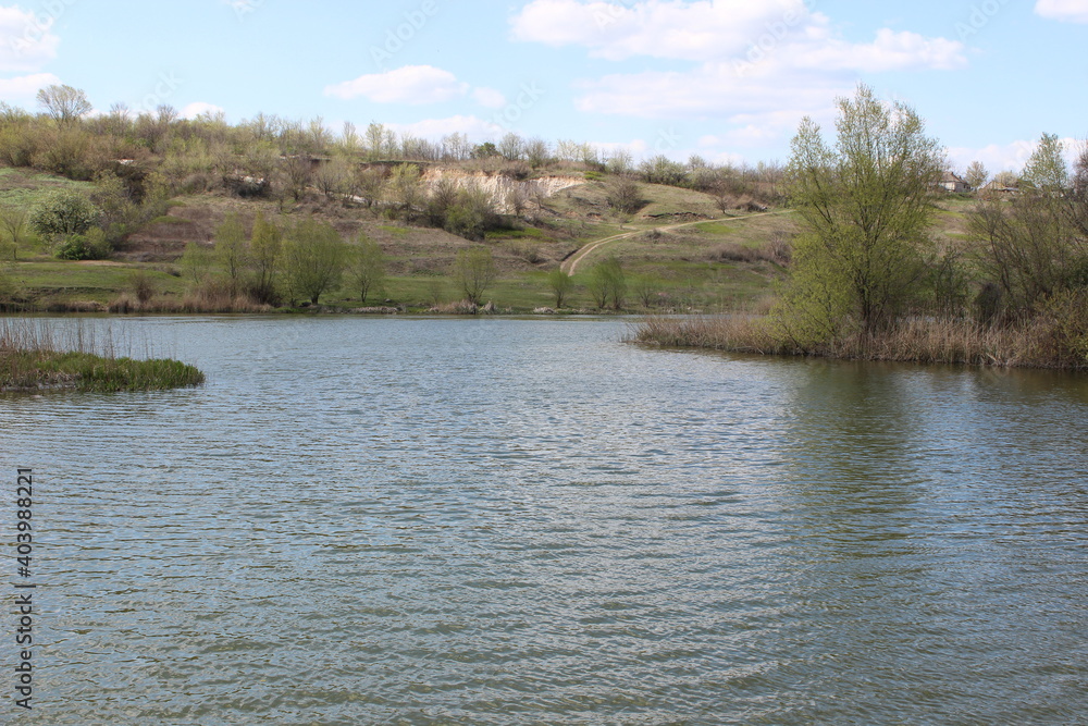 River with large granite stones. Steppe. Nature