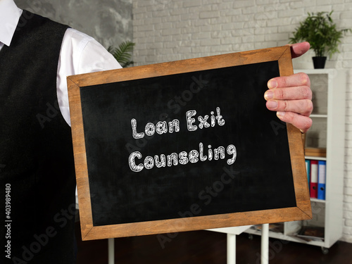 Financial concept about Loan Exit Counseling with sign on the page.