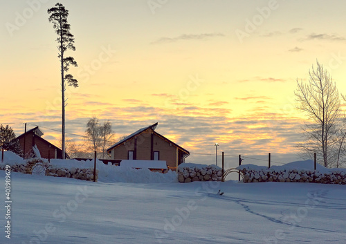 Two houses on a winter morning