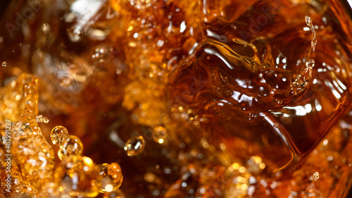 Ice Cube falling into Glass...
