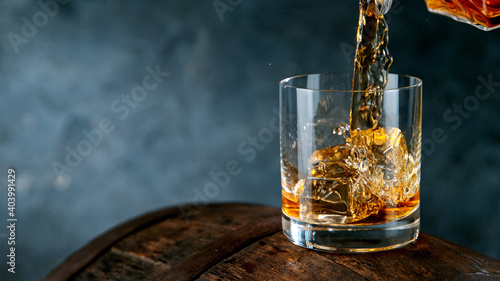 Whiskey Liquid falling into...