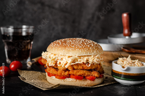 Homemade burger with chicken schnitzel photo