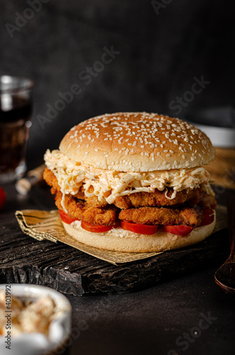 Homemade burger with chicken schnitzel photo