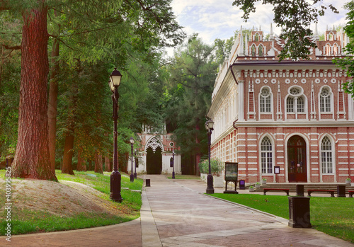 In Tsaritsyno Park. Palace and Park ensemble of the XVIII century, architect Vasily Bazhenov. Shaped "Grape arch" among the trees, "Opera house", red brick, white stone, Gothic style © ArhSib