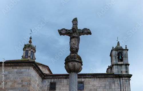 Low angle of an old stone cross in Ourense, Galicia, Spain