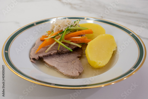 Stewed Pork with Root Vegetable Julienne of Carrots, Leeks, Horseradish and Potatoes called Steirisches Wurzelfleisch in Austria photo