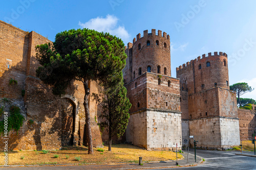 Photography Porta San Sebastiano, the largest of the gates in the defensive walls of the Aurelian Walls, the Via Appia, the regina viarum, passed through here on a summer day and with few cars