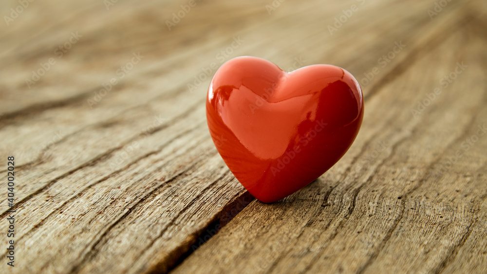 Fototapeta premium red heart on the vintage wooden table