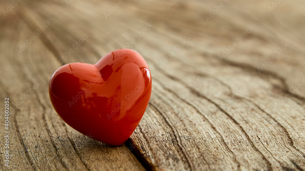 Fototapeta premium red heart on the vintage wooden table