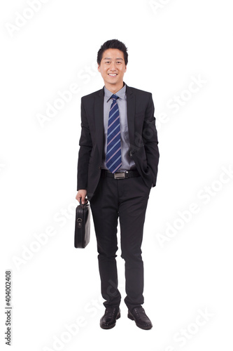 Business man holding portfolio posing in studio 