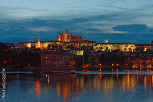 Evening view of Prague Castle and Charles Bridge over Vltava river from Novotneho Lavka, Prague, Czech © Sergey