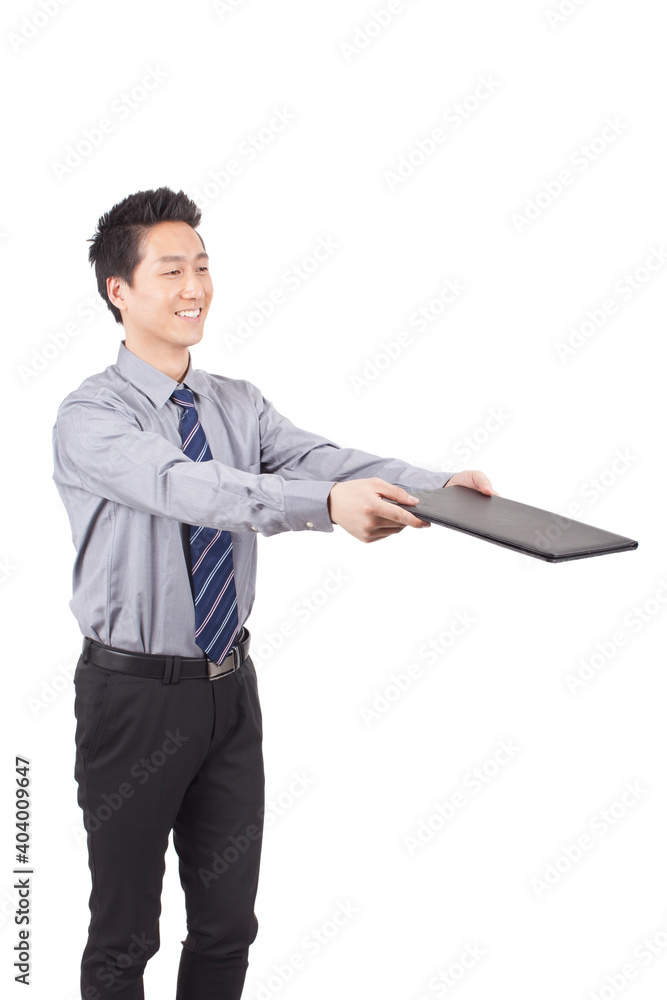 Business man holding notebook posing in studio Business man holding notebook posing in studio