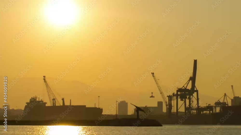 Time Lapse Movie of Heavy Shipyard Machinery Moving Cargo Containers in Port of izmir Turkey. High quality 4k footage Time Lapse Movie of Heavy Shipyard Machinery Moving Cargo Containers in Port of izmir Turkey. High quality 4k footage