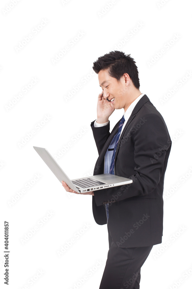 Business man Holding Laptop Computer And Phono Business man Holding Laptop Computer And Phono