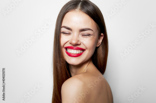 Woman with bare shoulders Eyes closed smile naked shoulders 