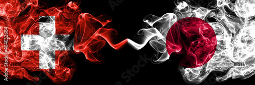 Switzerland  Swiss vs Japan  Japanese smoky mystic flags placed side by side. Thick colored silky abstract smoke flags.