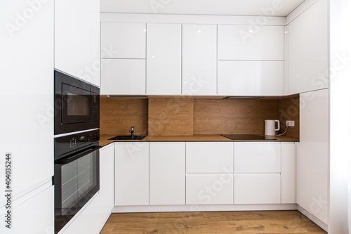 Interior photography, large white kitchen studio in a modern style, minimalism