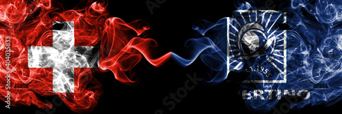 Switzerland  Swiss vs United States of America  America  US  USA  American  Cupertino  California smoky mystic flags placed side by side. Thick colored silky abstract smoke flags.