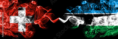 Switzerland, Swiss vs United States of America, America, US, USA, American, Fort Worth, Texas smoky mystic flags placed side by side. Thick colored silky abstract smoke flags.