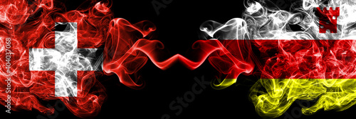 Switzerland, Swiss vs United States of America, America, US, USA, American, Santa Barbara, California smoky mystic flags placed side by side. Thick colored silky abstract smoke flags.