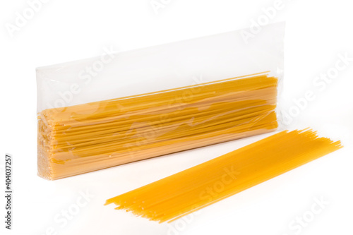 Bagged and out-of- bag bunch of spaghetti isolated on white background