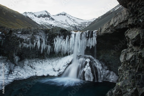 Winter panorama of frozen Innstifoss waterfall icicles behind Fremstifoss and Skutafoss near Hofn South Iceland Europe photo