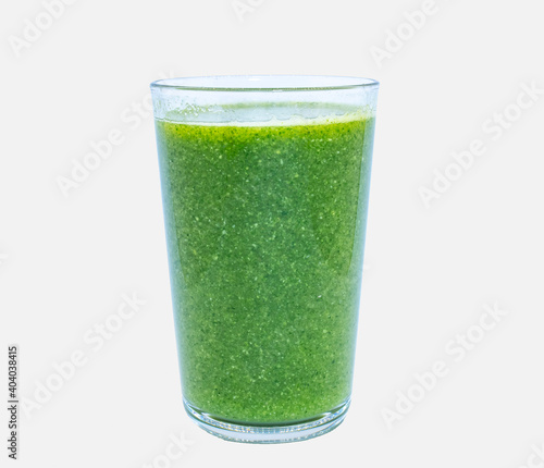 Healthy food and drink concept. New years resolution. A glass of green smoothy juice isolated on white background, space for copy
