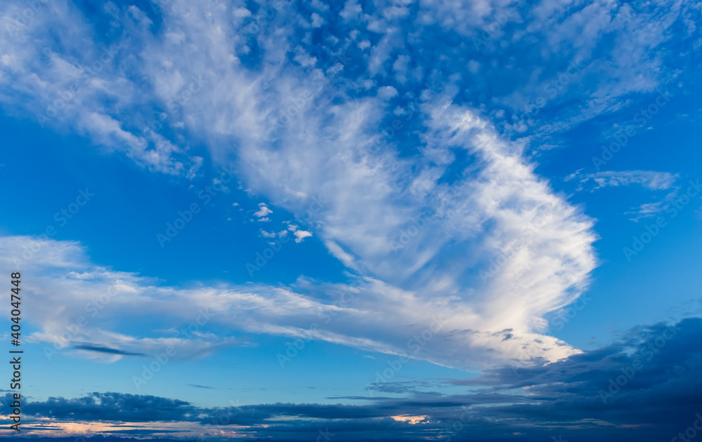 Blue sky with white picturesque clouds and mountains Blue sky with white picturesque clouds and mountains