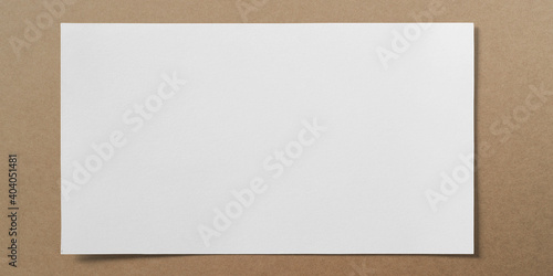 white paper on brown paper ...