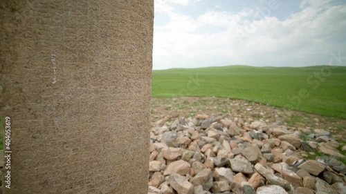 Historical runic alphabet inscription in Moyuncor stone monument site.Ancient megalith sine usu us bayan cor cur taryat moyun mogoyn moyencur terhin megaliths carved with symbol symbols photo