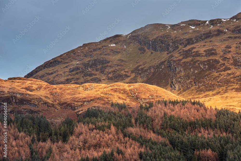 Majestic landscape image across Loch Lomond looking towards snow capped Ben Lui mountain peak in Scottish Highlands Majestic landscape image across Loch Lomond looking towards snow capped Ben Lui mountain peak in Scottish Highlands