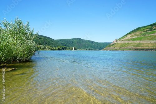 the Mother Nature . the clear water of the river and the mountain . the harmony between water and green color gives this Photo the life again 