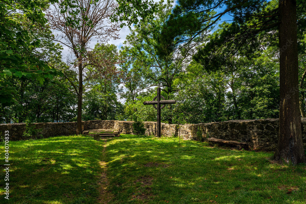 A cross in the park of the Grodziec castle complex, Poland.