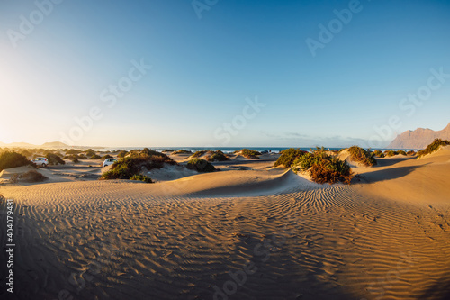 Sandy dunes at sunset in Famara beach  Lanzarote.