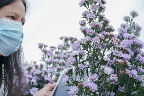 Gardeners checking for pests and diseases in the garden.