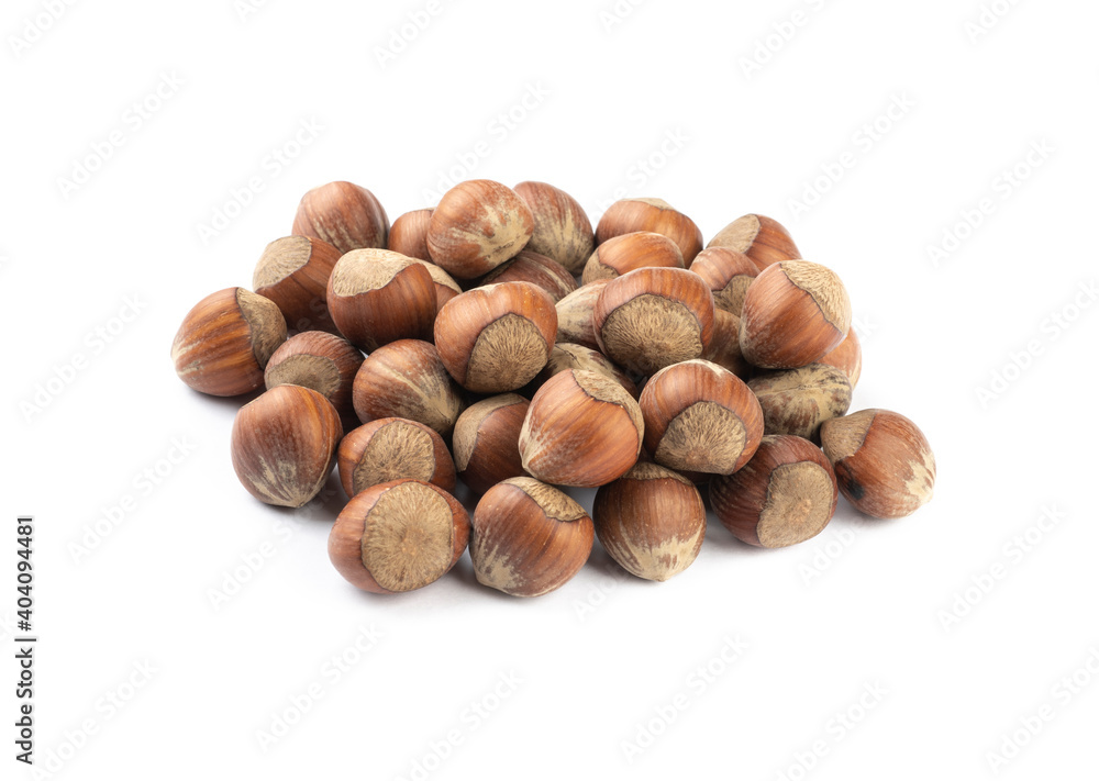A group of hazelnuts isolated over white background A group of hazelnuts isolated over white background