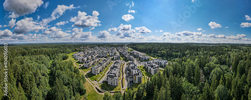 Aerial view of Sanatriskes living district in the middle of Verkiai national park by drone
